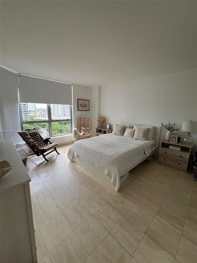 3600 NE Mystic Pointe Dr Unit 1010, Aventura, FL 33180 - bedroom featuring light tile patterned floors
