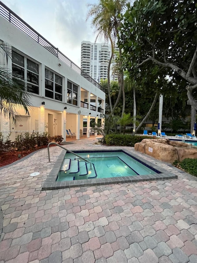 3600 NE Mystic Pointe Dr Unit 1010, Aventura, FL 33180 - community pool with a patio area