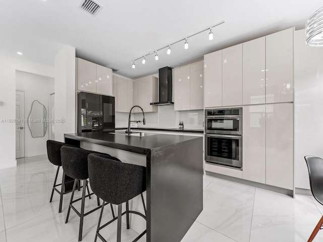 171 NW 152nd Ave, Pembroke Pines, FL 33028 - kitchen with wall chimney exhaust hood, fridge, modern cabinets, double oven, and dark countertops