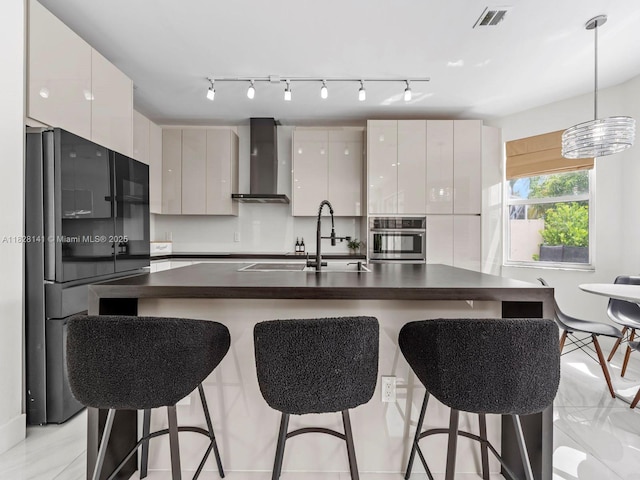 171 NW 152nd Ave, Pembroke Pines, FL 33028 - kitchen with wall chimney range hood, freestanding refrigerator, dark countertops, oven, and modern cabinets
