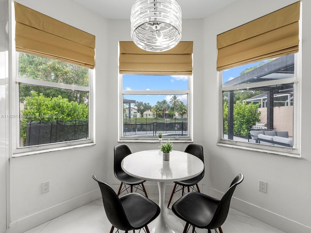 171 NW 152nd Ave, Pembroke Pines, FL 33028 - dining room with baseboards