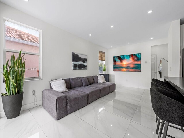 171 NW 152nd Ave, Pembroke Pines, FL 33028 - living area featuring recessed lighting and light marble finish flooring