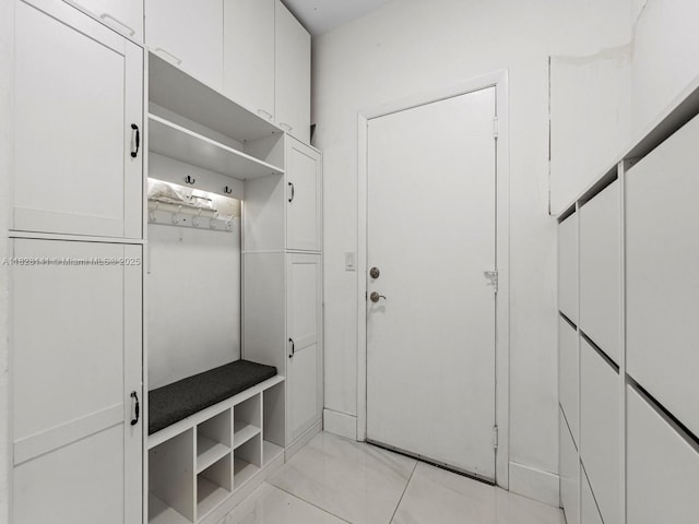 171 NW 152nd Ave, Pembroke Pines, FL 33028 - mudroom featuring light marble finish floors