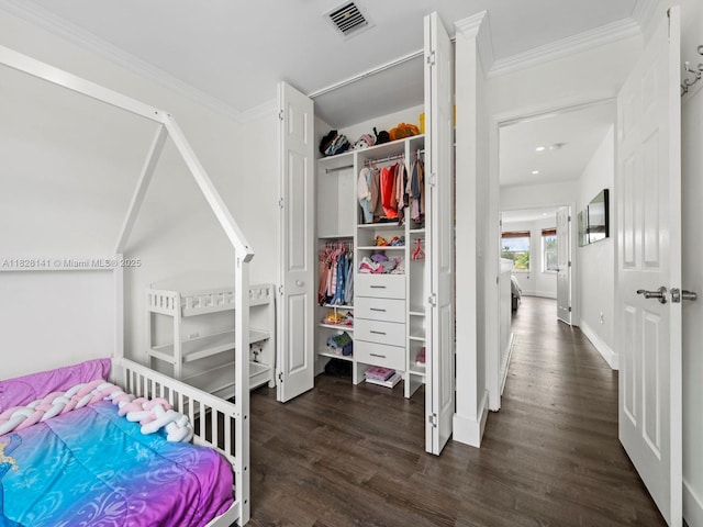 171 NW 152nd Ave, Pembroke Pines, FL 33028 - bedroom featuring wood finished floors, crown molding, and a closet