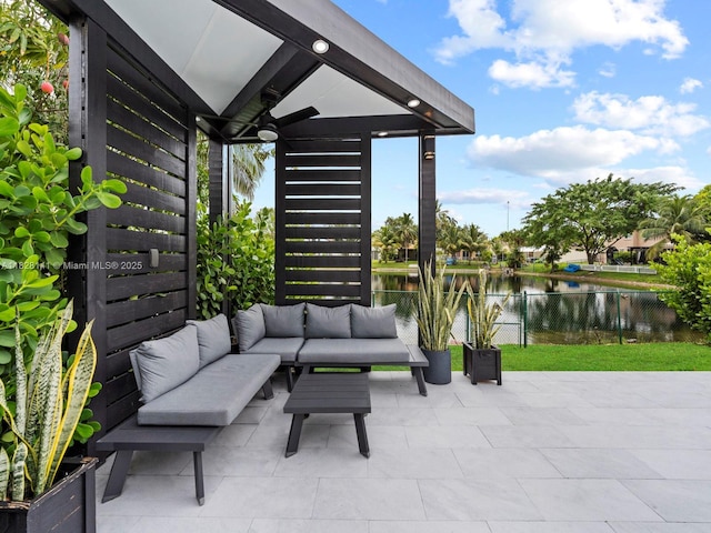 171 NW 152nd Ave, Pembroke Pines, FL 33028 - view of patio with an outdoor hangout area and a water view
