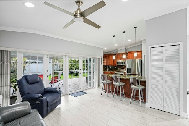 1173 NW 134th Pl, Miami, FL 33182 - living room featuring ornamental molding, french doors, vaulted ceiling, ceiling fan, and recessed lighting