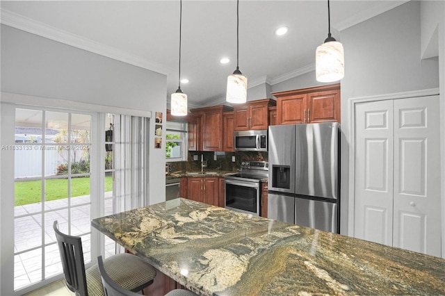 1173 NW 134th Pl, Miami, FL 33182 - kitchen featuring stainless steel appliances, ornamental molding, decorative backsplash, recessed lighting, and a breakfast bar area