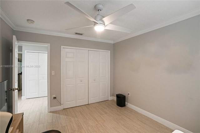 1173 NW 134th Pl, Miami, FL 33182 - unfurnished bedroom with crown molding, a closet, a ceiling fan, and light wood-type flooring