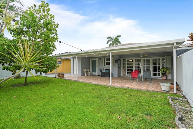 1173 NW 134th Pl, Miami, FL 33182 - back of property featuring a patio area, a lawn, and ceiling fan
