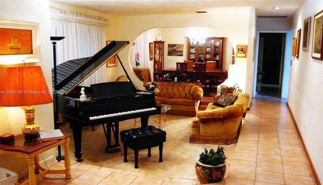 17123 SW 78th Pl, Palmetto Bay, FL 33157 - sitting room featuring tile patterned floors and arched walkways