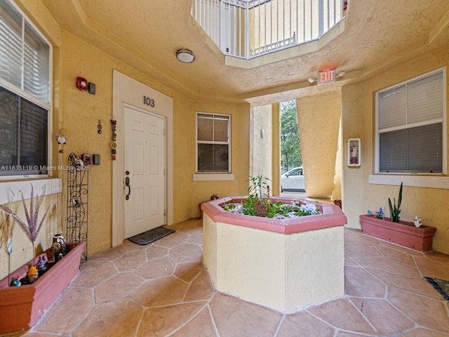 8912 W Flagler St Unit 103, Miami, FL 33174 - property entrance with stucco siding and a patio