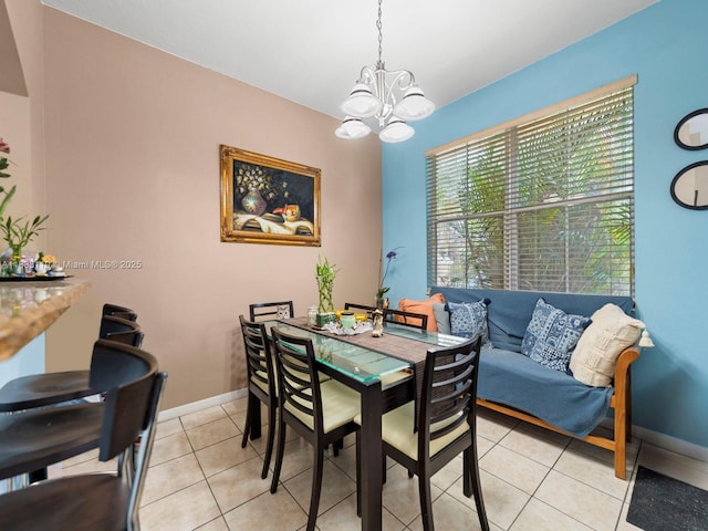 8912 W Flagler St Unit 103, Miami, FL 33174 - dining room featuring a chandelier and light tile patterned floors