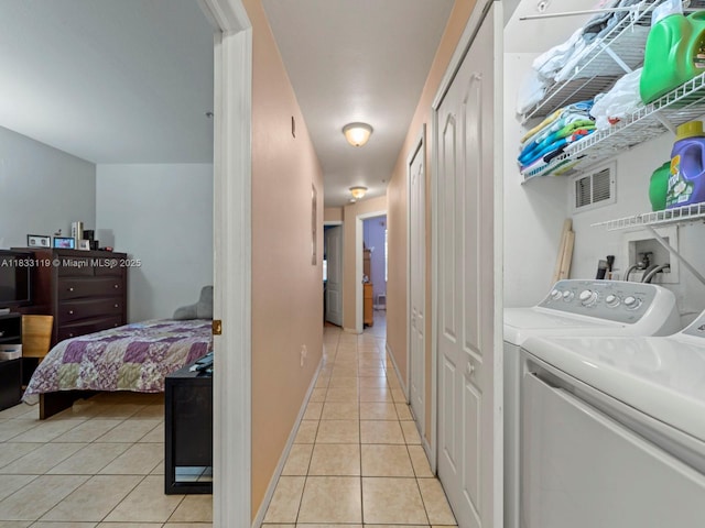 8912 W Flagler St Unit 103, Miami, FL 33174 - washroom with light tile patterned floors and washer and dryer