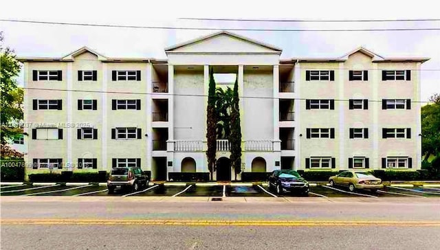 1212 SE 2nd Ct Unit 103, Fort Lauderdale, FL 33301 - view of building exterior with uncovered parking