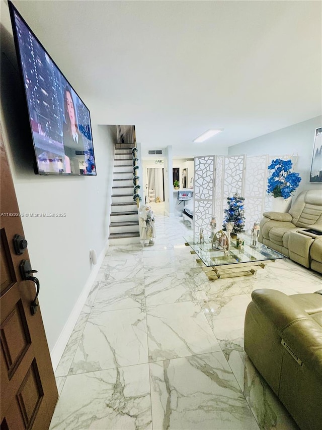 5072 W 12th Ln Unit D-14, Hialeah, FL 33012 - living area with marble finish floors and stairway