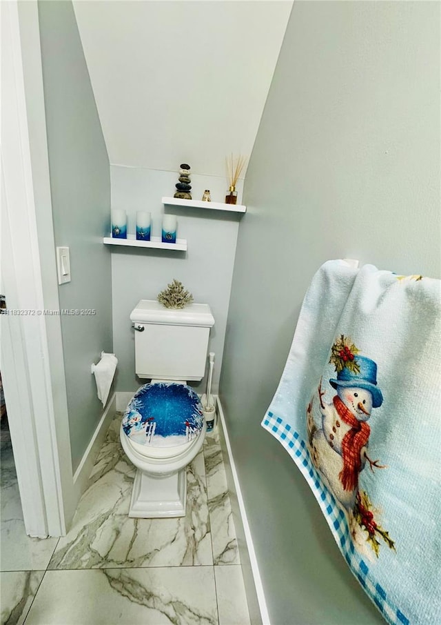 5072 W 12th Ln Unit D-14, Hialeah, FL 33012 - bathroom with baseboards and marble look tile flooring