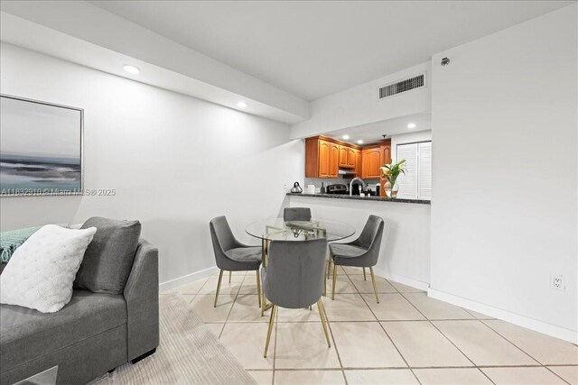 540 Brickell Key Dr Unit 412, Miami, FL 33131 - dining room featuring recessed lighting and light tile patterned flooring