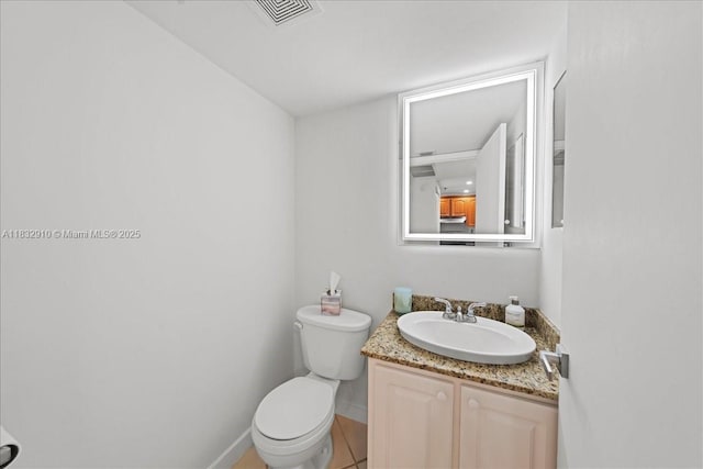 540 Brickell Key Dr Unit 412, Miami, FL 33131 - half bathroom featuring vanity and toilet