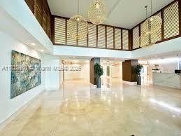 540 Brickell Key Dr Unit 412, Miami, FL 33131 - building lobby featuring a high ceiling