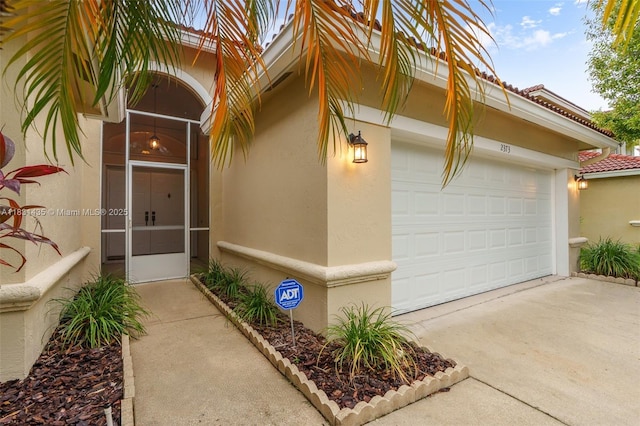 2373 NW 195th Ave, Pembroke Pines, FL 33029 - entrance to property with stucco siding, a garage, and concrete driveway