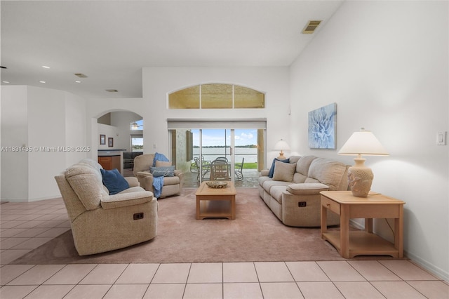 2373 NW 195th Ave, Pembroke Pines, FL 33029 - living area featuring arched walkways, light tile patterned floors, and recessed lighting
