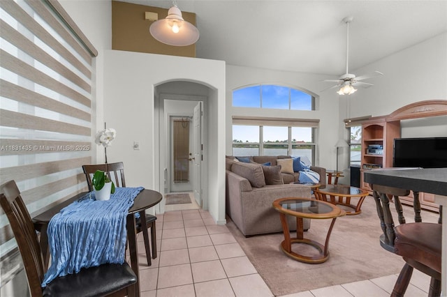 2373 NW 195th Ave, Pembroke Pines, FL 33029 - living area featuring light tile patterned floors, arched walkways, a towering ceiling, and ceiling fan