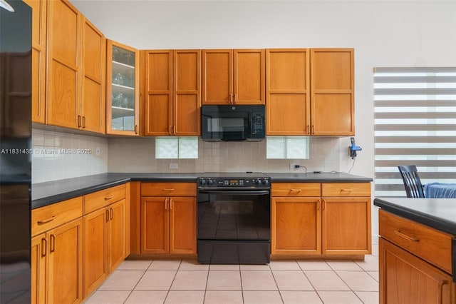 2373 NW 195th Ave, Pembroke Pines, FL 33029 - kitchen with black appliances, dark countertops, open shelves, and backsplash
