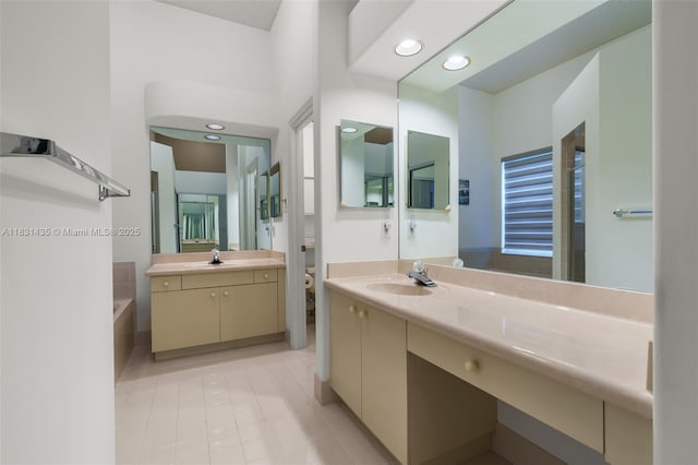 2373 NW 195th Ave, Pembroke Pines, FL 33029 - bathroom with vanity, a garden tub, tile patterned flooring, and recessed lighting