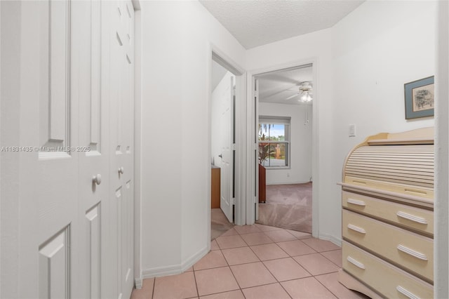 2373 NW 195th Ave, Pembroke Pines, FL 33029 - hallway featuring light colored carpet, light tile patterned flooring, and a textured ceiling
