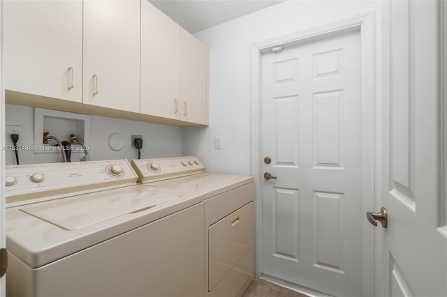 2373 NW 195th Ave, Pembroke Pines, FL 33029 - washroom featuring cabinet space, independent washer and dryer, and a textured ceiling
