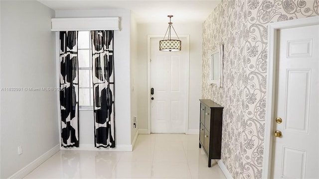 1491 SE 25th Ter Unit 1491, Homestead, FL 33035 - foyer entrance with baseboards and wallpapered walls