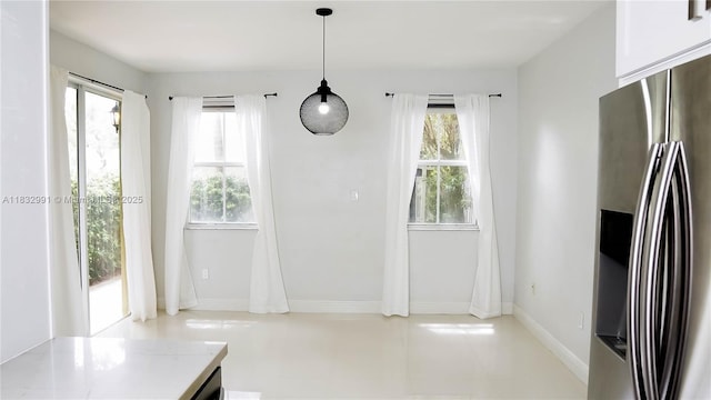 1491 SE 25th Ter Unit 1491, Homestead, FL 33035 - unfurnished dining area with baseboards