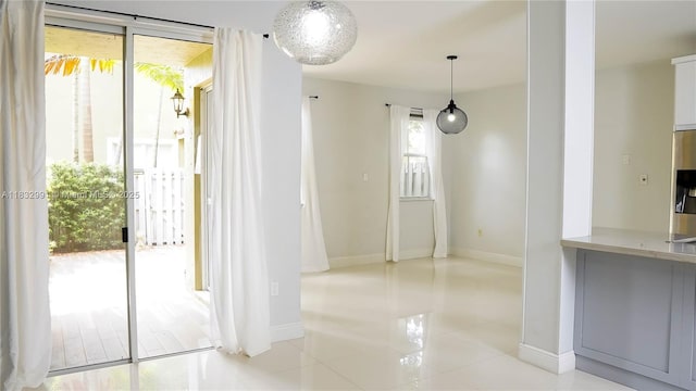 1491 SE 25th Ter Unit 1491, Homestead, FL 33035 - unfurnished dining area featuring baseboards and tile patterned floors
