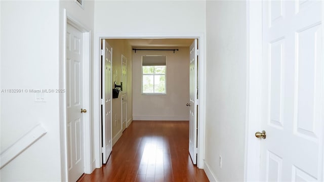 1491 SE 25th Ter Unit 1491, Homestead, FL 33035 - hall featuring dark wood-style flooring and baseboards