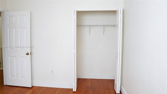 1491 SE 25th Ter Unit 1491, Homestead, FL 33035 - unfurnished bedroom with a closet and wood finished floors