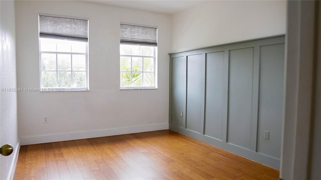 1491 SE 25th Ter Unit 1491, Homestead, FL 33035 - unfurnished bedroom with light wood finished floors and baseboards