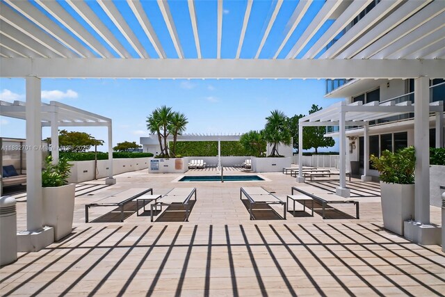 4250 Biscayne Blvd Unit 1206, Miami, FL 33137 - view of patio / terrace featuring a pergola and a swimming pool