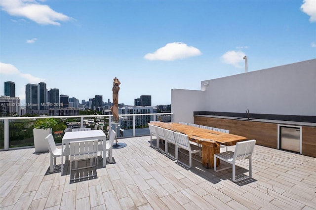 4250 Biscayne Blvd Unit 1206, Miami, FL 33137 - view of patio / terrace featuring outdoor dining space and a skyline view