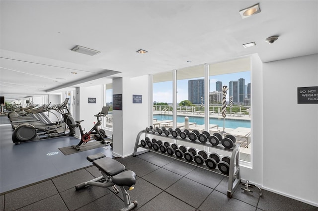 4250 Biscayne Blvd Unit 1206, Miami, FL 33137 - workout area with a view of skyline and floor to ceiling windows