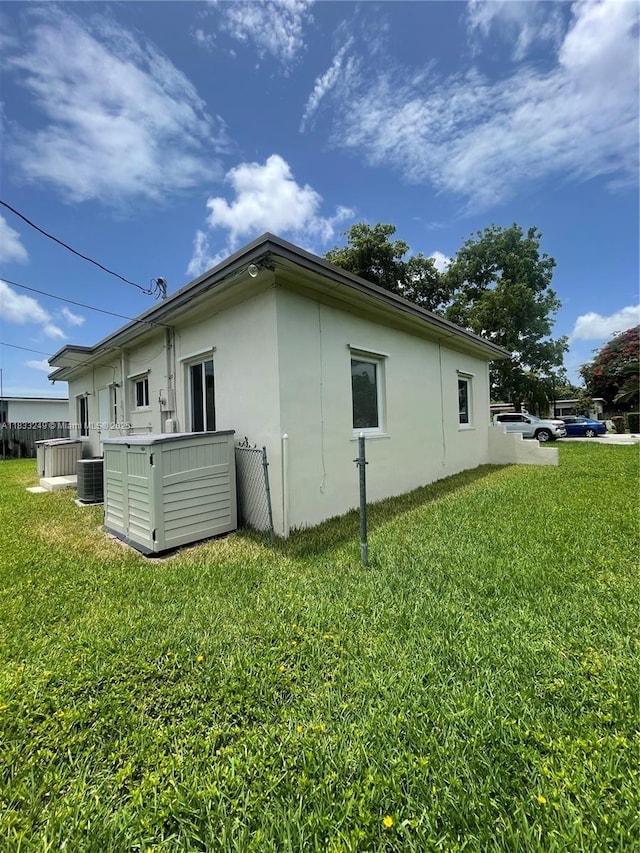 6250 SW 16th Ter, West Miami, FL 33155 - view of property exterior featuring stucco siding and a yard