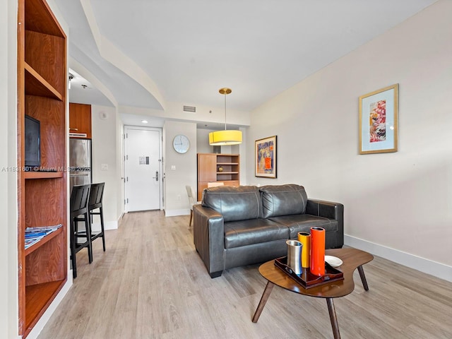 1395 Brickell Ave Unit 3310, Miami, FL 33131 - living room with light wood-style floors