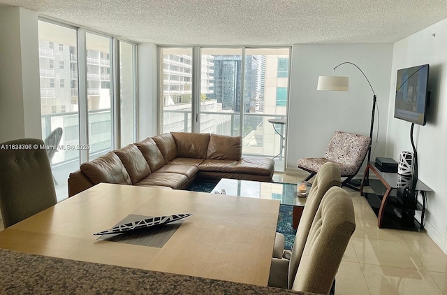 1155 Brickell Bay Dr Unit 1401, Miami, FL 33131 - living room featuring a textured ceiling and tile patterned floors