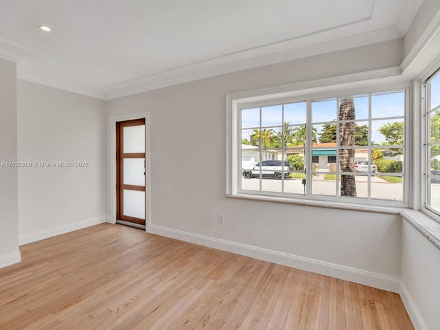 9033 Carlyle Ave, Surfside, FL 33154 - empty room featuring ornamental molding, light wood-style flooring, and recessed lighting