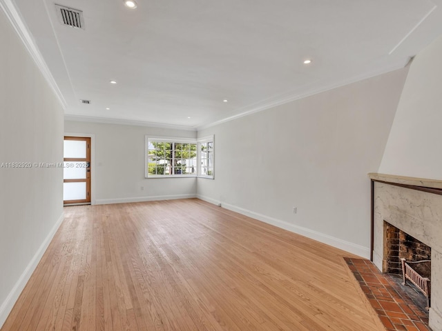 9033 Carlyle Ave, Surfside, FL 33154 - unfurnished living room with wood-type flooring, a fireplace, ornamental molding, and recessed lighting