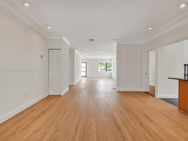 9033 Carlyle Ave, Surfside, FL 33154 - spare room featuring ornamental molding, light wood-type flooring, and recessed lighting
