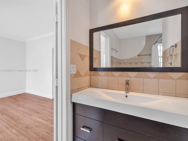 9033 Carlyle Ave, Surfside, FL 33154 - bathroom featuring vanity, wood finished floors, backsplash, ornamental molding, and a shower with curtain