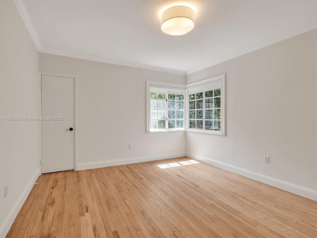 9033 Carlyle Ave, Surfside, FL 33154 - empty room with crown molding and light wood-style flooring