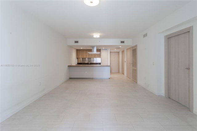 1000 Brickell Plz Unit 3703, Miami, FL 33131 - unfurnished living room featuring a sink