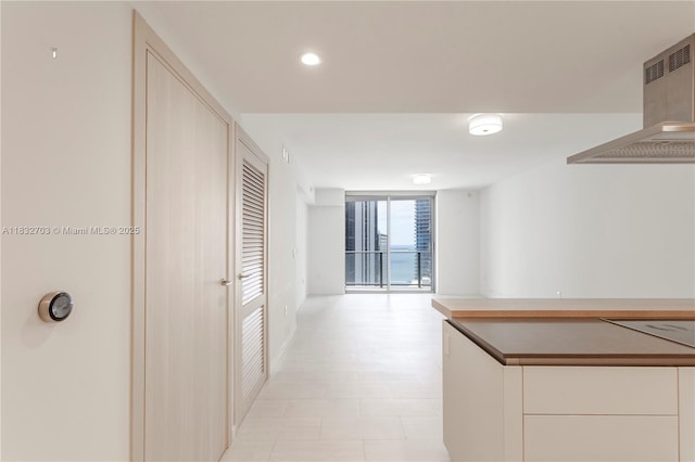 1000 Brickell Plz Unit 3703, Miami, FL 33131 - hall featuring floor to ceiling windows and recessed lighting
