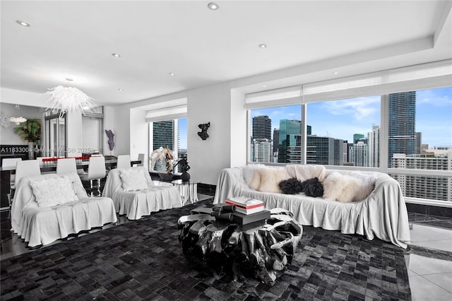 1425 Brickell Ave Unit 42E, Miami, FL 33131 - living room with a view of skyline, recessed lighting, and a chandelier